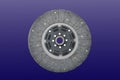 Clutch disc, car clutch disc, car transmission, blue background Royalty Free Stock Photo