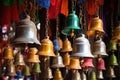 a clutter of bells in a colourful hindu temple