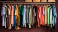 A clutter-free closet with clothes sorted by color