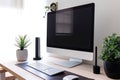 A clutter-free desk with a sleek computer setup. Home work space.