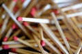 cluttered and disorganized set of red-headed phosphor sticks