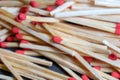 cluttered and disorganized set of red-headed phosphor sticks