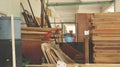 Cluttered Garage/ Storeroom with Vintage Old Woods, Metal Frames and Abandoned Equipments