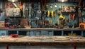 Cluttered workshop with tools and equipment on a table. Royalty Free Stock Photo