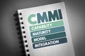 CMMI - Capability Maturity Model Integration acronym on notepad, technology concept background Royalty Free Stock Photo