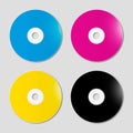 CMYK CD - DVD set on grey background Royalty Free Stock Photo