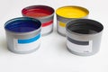 Cmyk color paints in cans Royalty Free Stock Photo