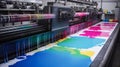 CMYK colors, printing house. Offset printing machine. Royalty Free Stock Photo