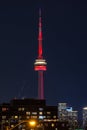 The CN Tower lit up for Valentines Day with red lights and a heart display