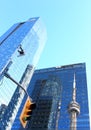 CN Tower reflected in Marsh & McLennan skyscraper in Toronto. Royalty Free Stock Photo