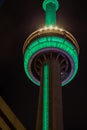 Close up top of CN tower at night. Smudgy clouds. Royalty Free Stock Photo