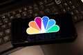 CNBC logo on smart phone screen , , background is a keyboard , Sydney Australia July 30 2022