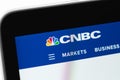 CNBC logo website on display notebook closeup Royalty Free Stock Photo