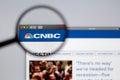 CNBC News logo visible  through a magnifying glass. Royalty Free Stock Photo