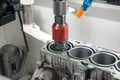 CNC Automatic Cylinder Honing Machine of engine. Car workshop, machine with a Computer numerical control.