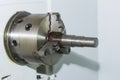 Cnc industrial lathe turning spindle chuck and product part on machine