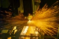 Laser cutting. Metal machining with sparks Royalty Free Stock Photo