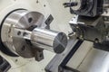 The CNC lathe machine clamping steel rod .