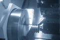 The  CNC lathe machine groove cutting the metal pulley parts. Royalty Free Stock Photo