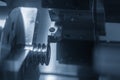 The CNC lathe machine groove cutting the pulley parts. Royalty Free Stock Photo