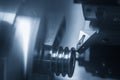 The  CNC lathe machine groove cutting the pulley parts. Royalty Free Stock Photo