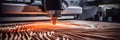 Cnc machine crafting elaborate design on wood, emphasizing distinct wood grain patterns