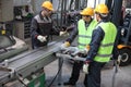 Workers at CNC machine shop Royalty Free Stock Photo