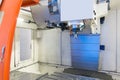 cnc metal working machine with cutter tool during metal detail milling