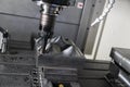 The CNC milling machine cutting the mold part in roughing Royalty Free Stock Photo