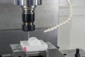 The  CNC milling machine cutting the nylon 6 material part with ball end mill tool Royalty Free Stock Photo