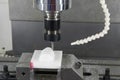 The CNC milling machine cutting the nylon 6 material part with ball end mill tool Royalty Free Stock Photo