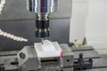 The CNC milling machine hi-precision cutting the plastic parts by solid ball endmill tool. Royalty Free Stock Photo