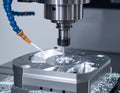 CNC milling machine processing with cooling Royalty Free Stock Photo
