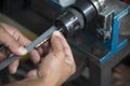 The CNC operator measure the tool length of endmill tool Royalty Free Stock Photo