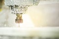 CNC router machine with soft shutter and lighting flares Royalty Free Stock Photo