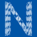 Cnceptual font made of leafs isolated on blue Royalty Free Stock Photo