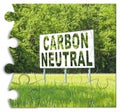 CO2 Carbon Neutral concept against an advertising billboard immersed in nature - solutions concept in jigsaw puzzle shape Royalty Free Stock Photo