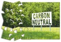 CO2 Carbon Neutral concept against an advertising billboard immersed in nature - solutions concept in jigsaw puzzle shape Royalty Free Stock Photo