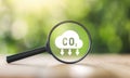 CO2 emission concept. Green industries business concept. Net zero emissions. Magnifying glass with Co2 symbol. Concepts Net Zero