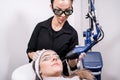 CO2 fractional ablative laser being used for skin rejuvenation skin resurfacing as a medical cosmetic procedure in a beauty