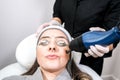 CO2 fractional ablative laser being used for skin rejuvenation skin resurfacing as a medical cosmetic procedure in a beauty