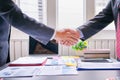 Co-investment business shaking hands successful deal after great meeting. Royalty Free Stock Photo