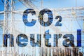 CO2 Neutral text - concept image against a electricity pylon