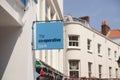 The Co-Operative Bank sign on the High Street in the town of St Pierre Port St Peter Port, the main settlement of Guernsey, The