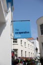 The Co-Operative Bank sign on the High Street in the town of St Pierre Port St Peter Port, the main settlement of Guernsey, The