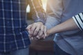 Co worker join hands together in the office for unity, team work concept Royalty Free Stock Photo