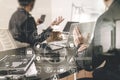 co working meeting,two businessman using VOIP headset with latop computer on desk in modern office as call center and customer se