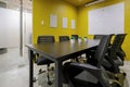 co working space modern style room with black chair,black table stylish room with soft lamp on yellow