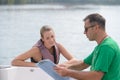 coach and athlete debriefing after water ski lesson Royalty Free Stock Photo