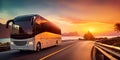 Coach bus traveling along a tranquil rural road, with a breathtaking sunset providing a captivating backdrop.